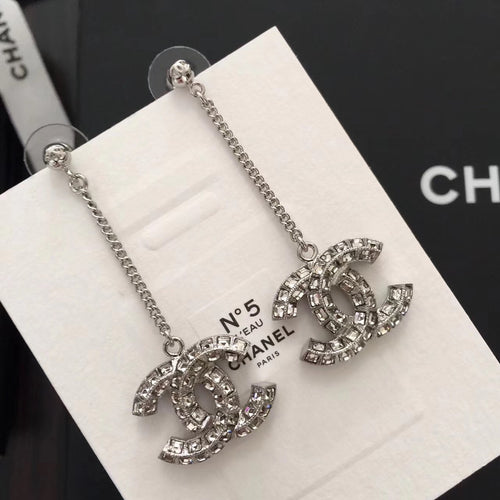 Rhinestone Chanel logo drop earrings, silver-tone chain with stud backs