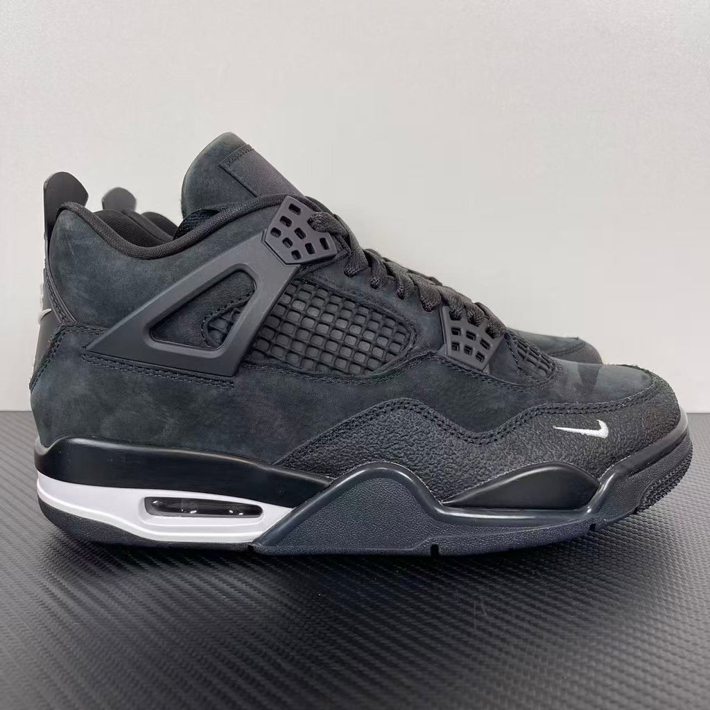 Air Jordan 4 sneakers in dark gray suede with mesh panel, lace-up, and Air unit