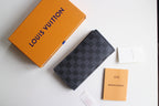 Louis Vuitton small wallet in dark checkered canvas, angled view
