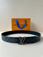 Checkered leather belt with silver-toned LV buckle and multiple eyelets