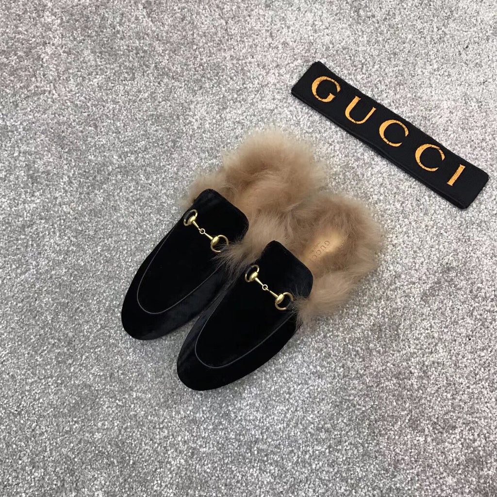 Black velvet loafer slide with beige faux fur lining and gold-tone ring detail