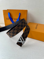 Louis Vuitton Damier check belt with silver V buckle and dark brown leather edge