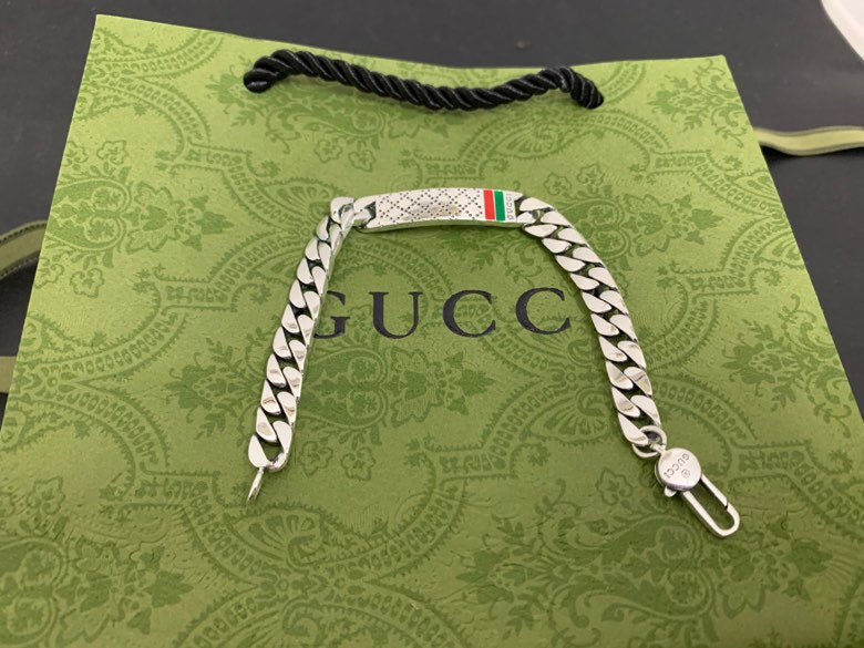 White leather strap with silver chain links and Gucci web stripe, with clasps