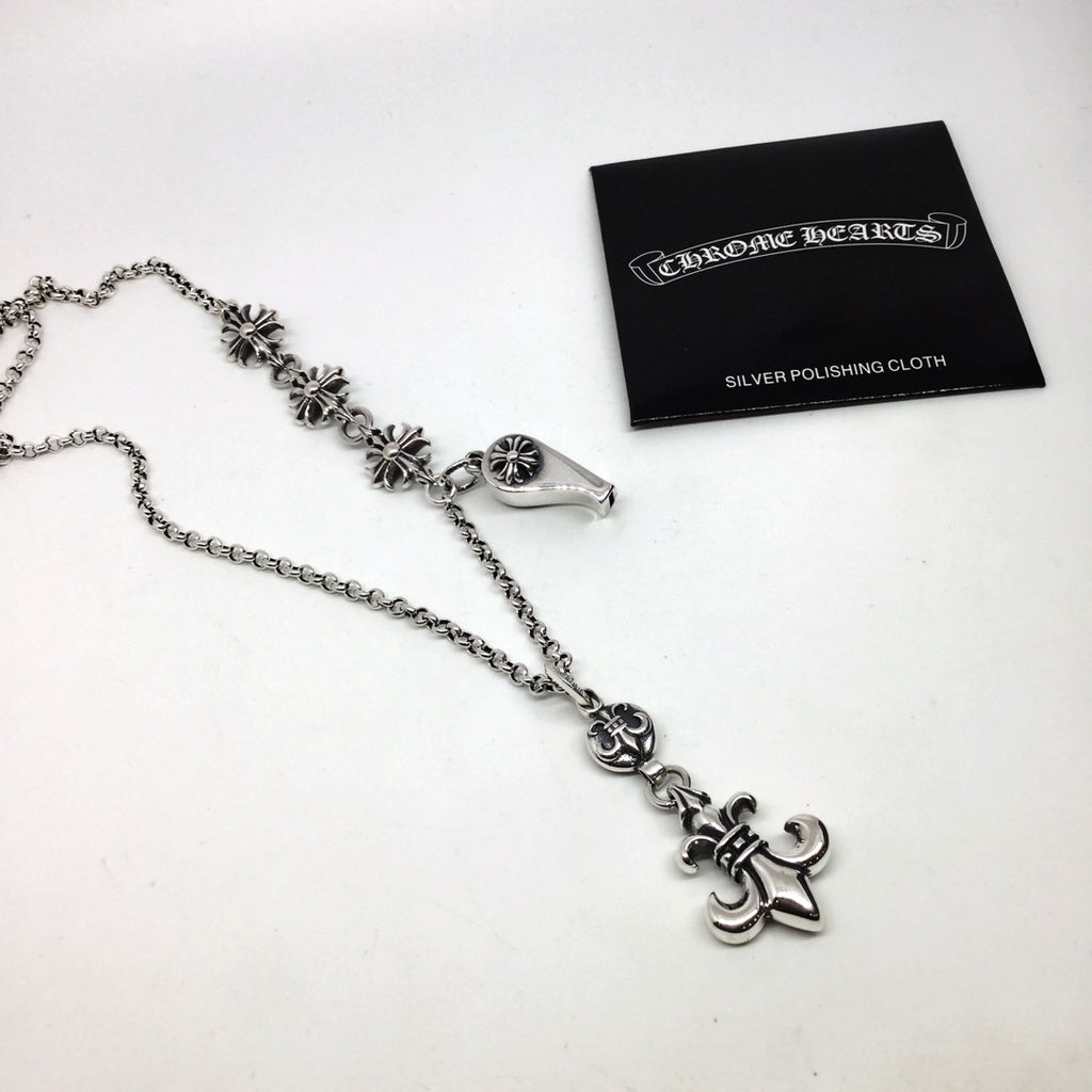 Silver chain necklace with fleur-de-lis and lock charms, with silver polishing cloth