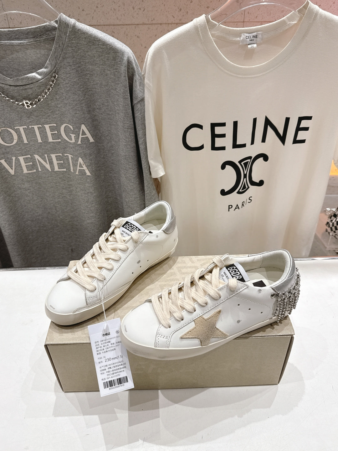 White Golden Goose low-top sneakers with lace-up front, side details visible