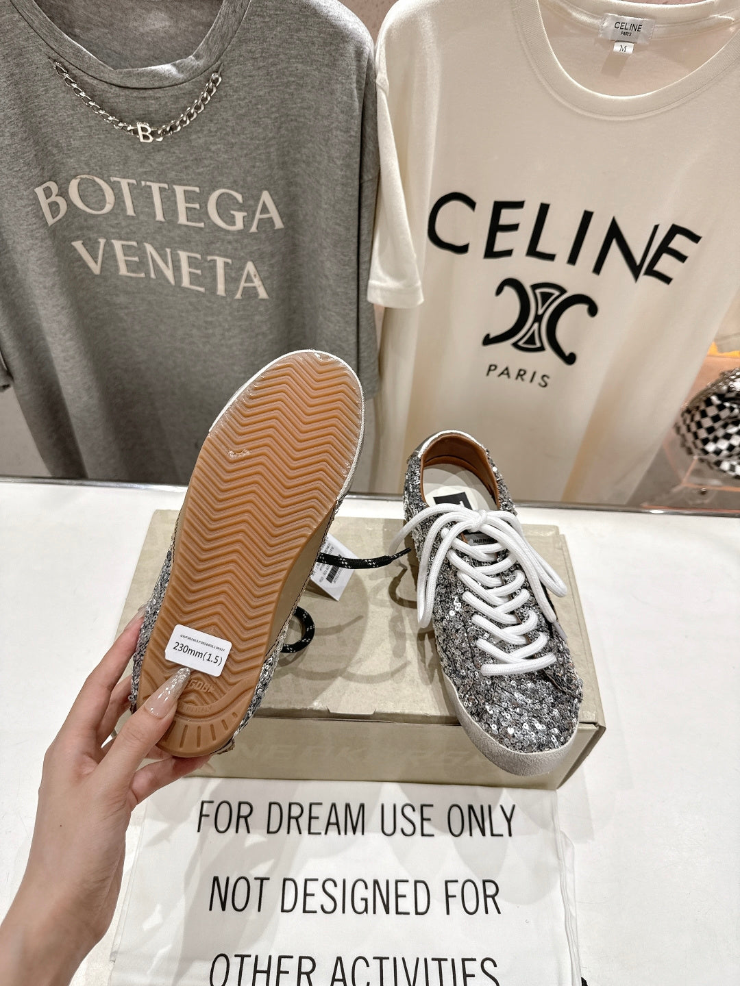 Sneakers with textured tan rubber sole, silver sequin upper and white laces