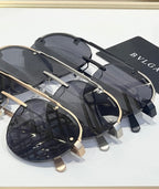Bvlgari sunglasses set with dark lenses and gold-toned metal arms