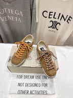 Golden Goose low-top sneakers in tan with brown laces and white star patch