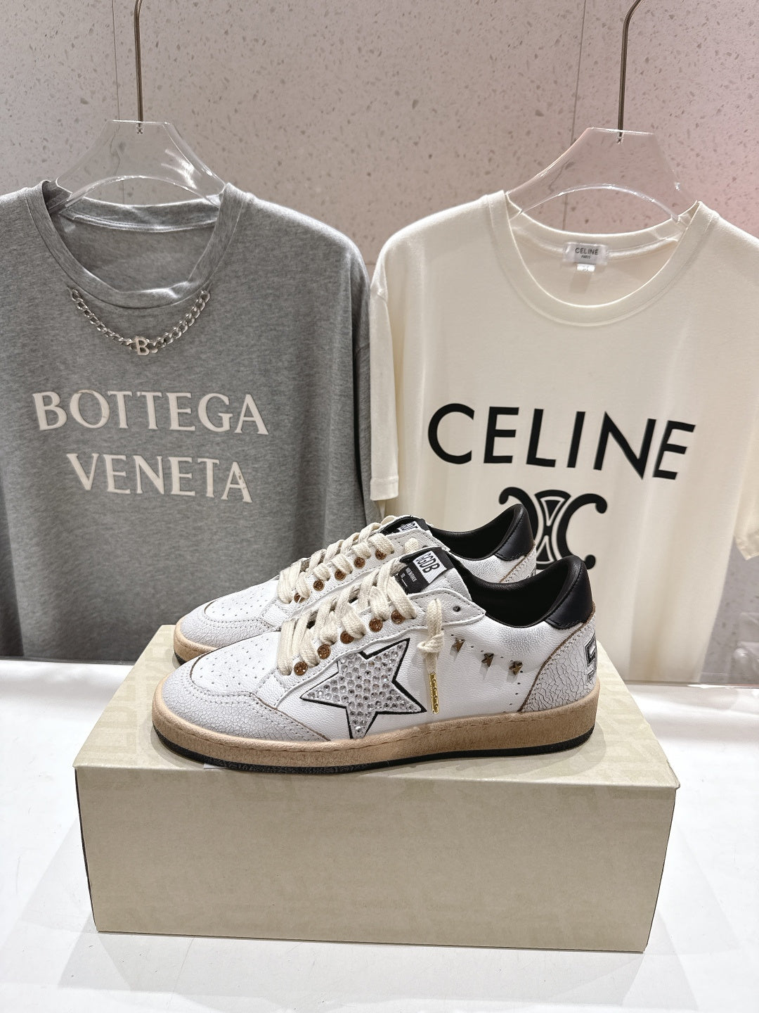 Golden Goose low-top sneakers, white leather with metallic star patch and black trim