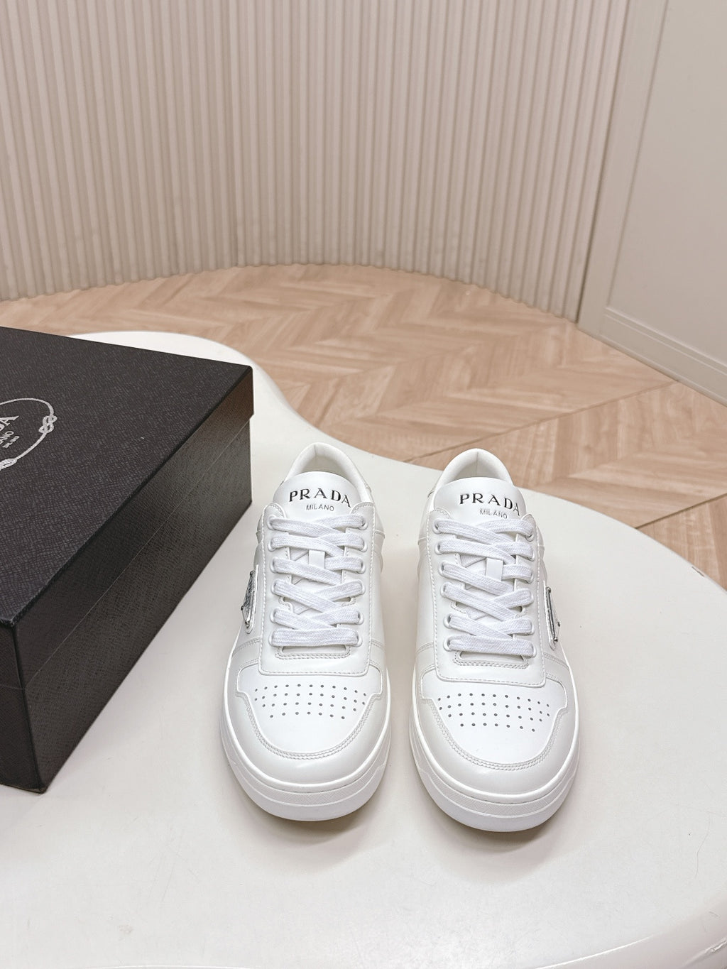 White Prada unisex lace-up sneakers with PRADA logo on tongue