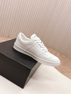 White Prada unisex low-top sneakers, side profile view
