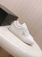 White Prada unisex low-top sneakers, side view with logo details