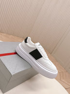 Prada unisex white low-top sneakers with black side panel and white platform sole