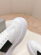 Prada unisex white sneakers with textured sidewall and black side panel detail