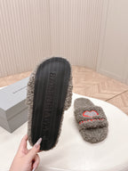 Balenciaga fuzzy slide sandals, black textured sole under grey plush upper