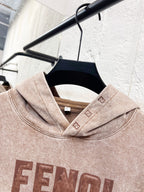 Beige FENDI hoodie neckline and hood, with front logo print detail.