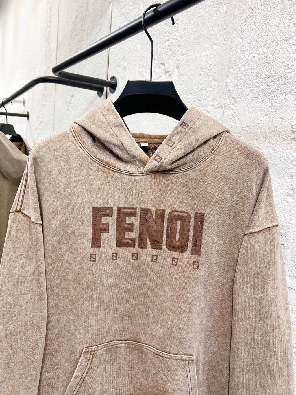 Beige FENDI hoodie sweatshirt with front graphic logo and kangaroo pocket.