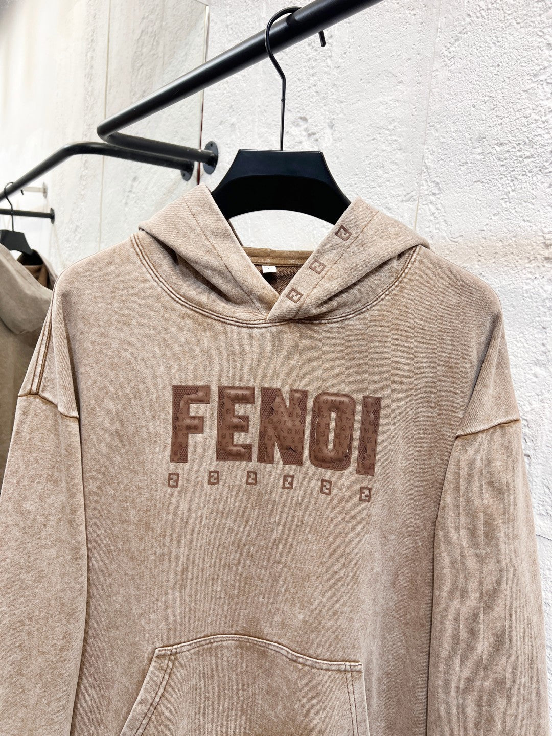 Beige FENDI hoodie sweatshirt with front graphic logo and kangaroo pocket.