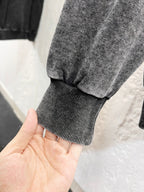 Heather gray hoodie cuff ribbing and knit hem edge