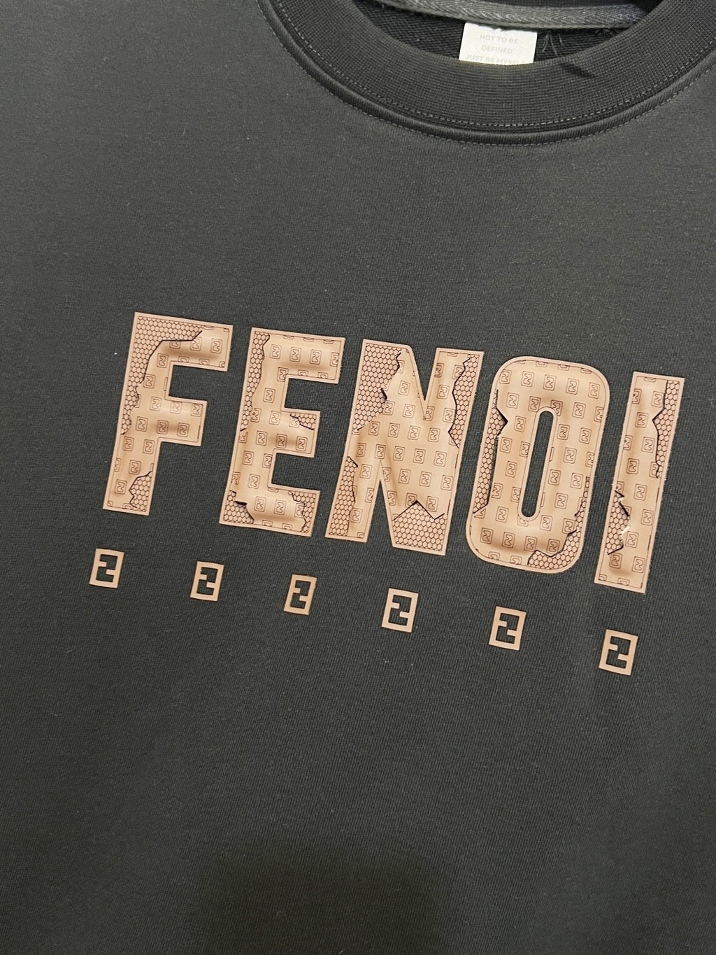 Black sweatshirt with large FENDI wordmark and small repeating E emblems