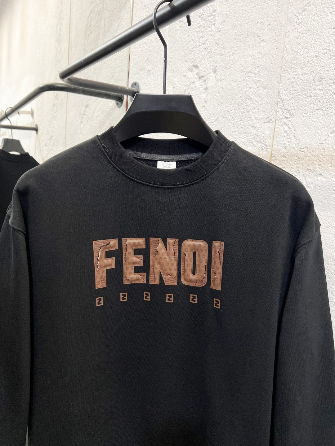 Black sweatshirt with FENDI logo print and small repeating E graphics