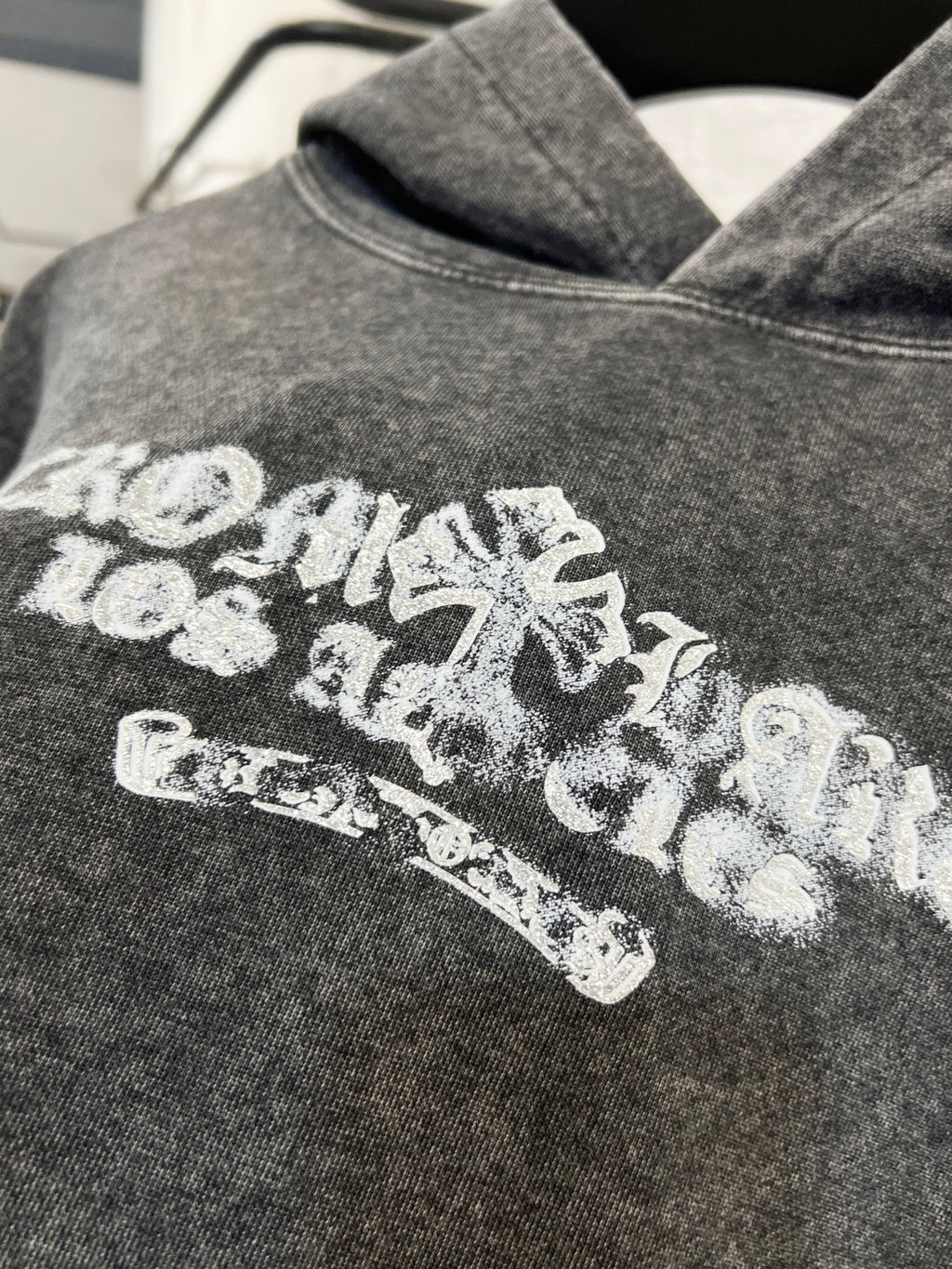 Heather gray hoodie sweatshirt with large white back graphic print