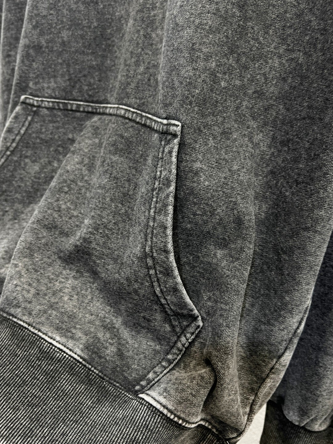 Heather gray hoodie with kangaroo pocket and contrast stitched seams
