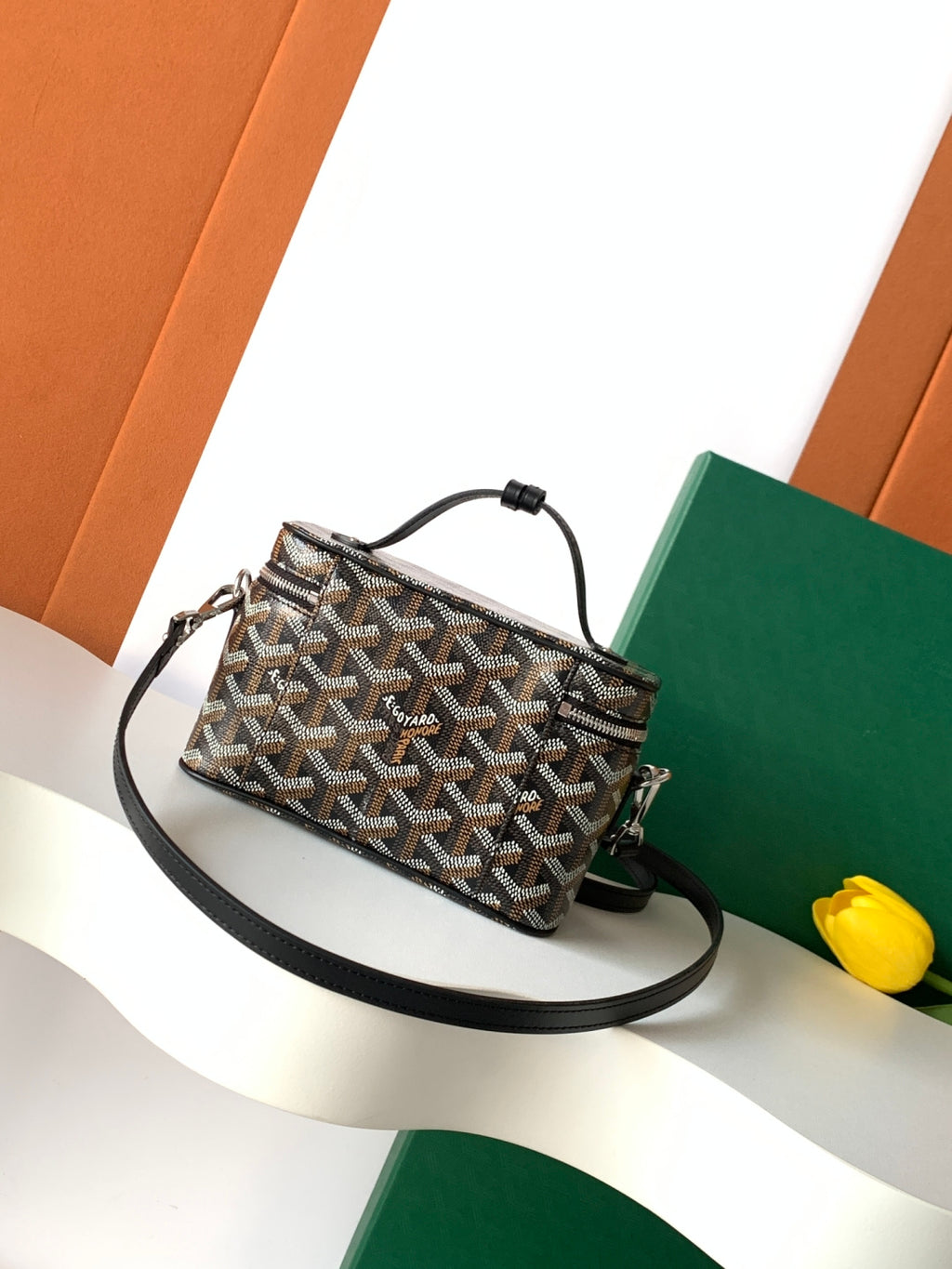 Goyard patterned mini crossbody pouch with black leather strap