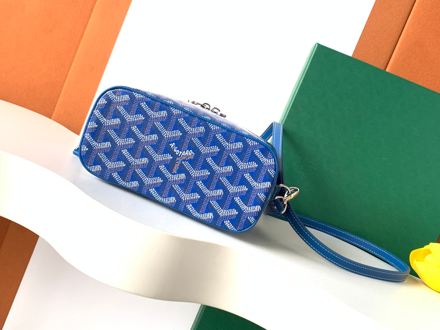 Goyard blue patterned rectangular mini bag with wrist strap and zipper