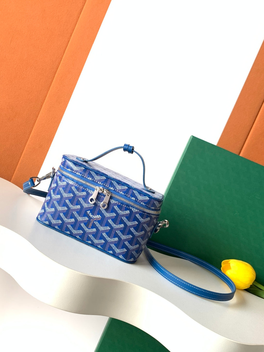 Goyard blue patterned mini crossbody bag with blue strap and top zipper