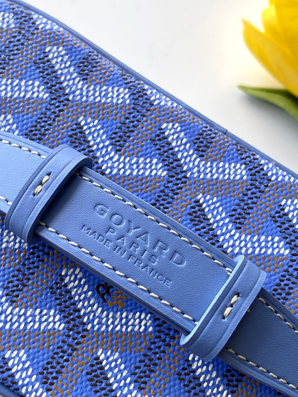 Blue patterned bag leather brand patch with embossed text