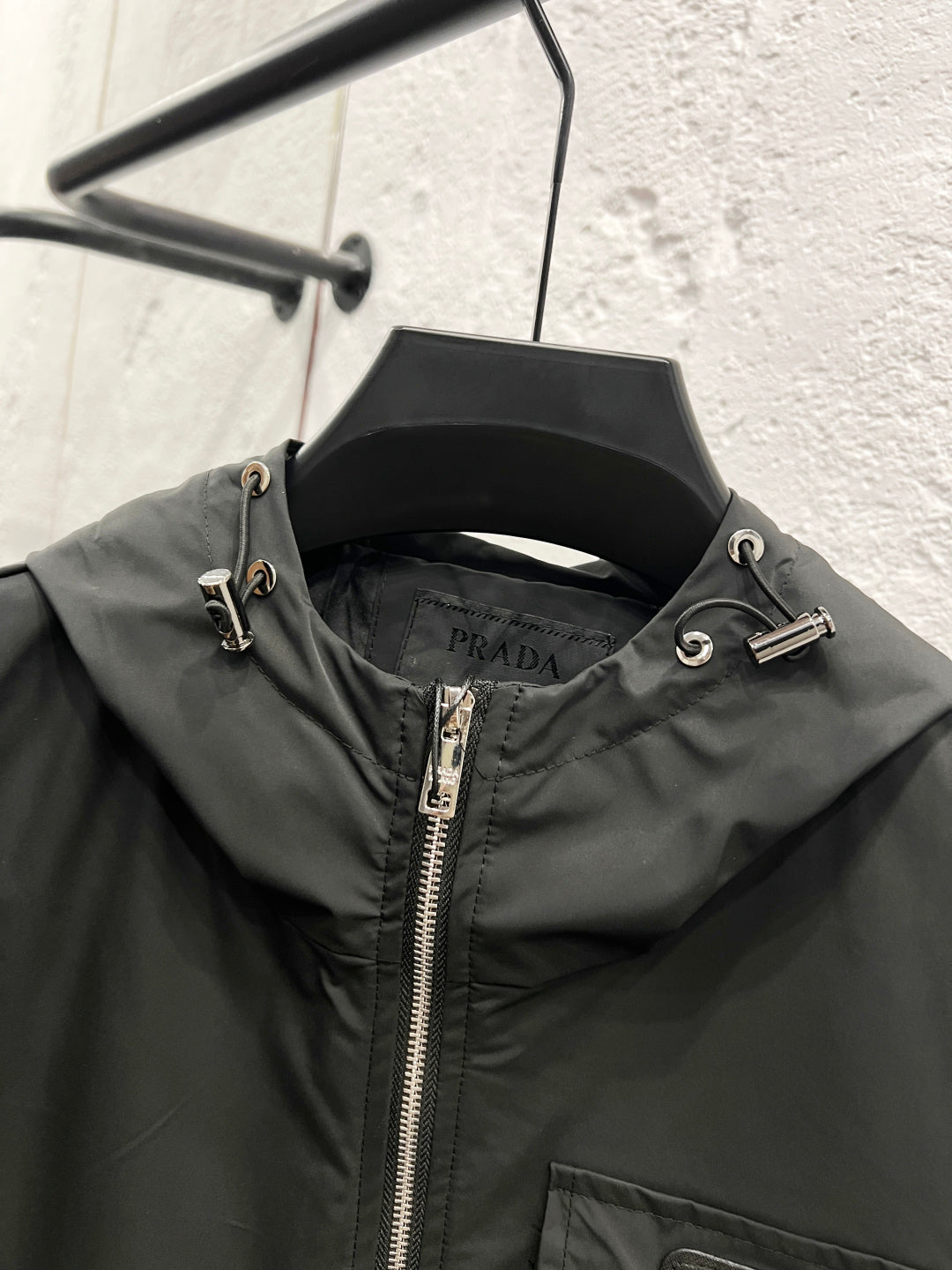 Prada black hooded jacket collar with drawstrings and silver buttons