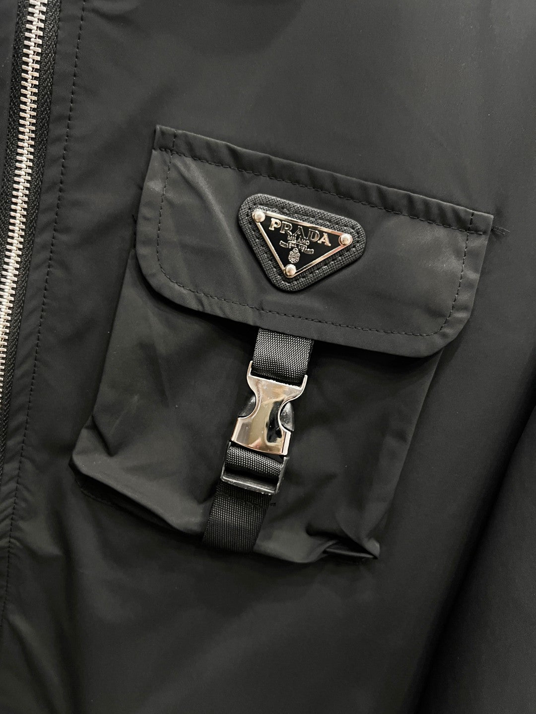 Prada black jacket with flap chest pocket and metal buckle strap