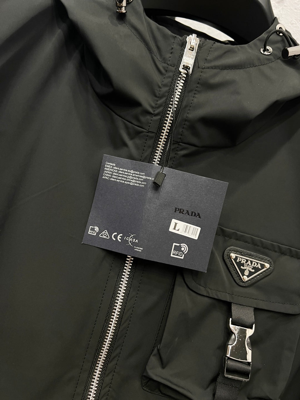 Prada black hooded jacket with silver zipper and PRADA logo patch