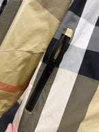 Burberry check hooded jacket front zipper detail on plaid fabric