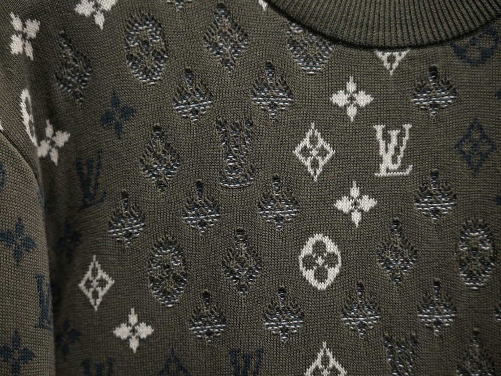 Louis Vuitton monogram sweatshirt knit close-up, textured dark olive with white motif pattern