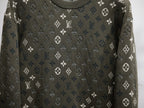 Louis Vuitton monogram long-sleeve sweatshirt close-up, dark olive with scattered white icons