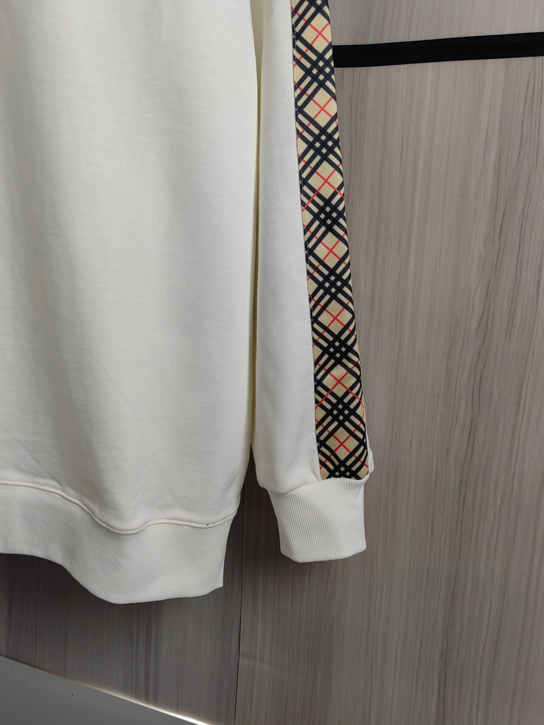 Burberry kids crewneck sweatshirt hem with cream cuffs and check sleeve trim.