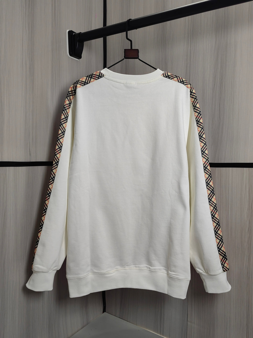 Burberry kids crewneck sweatshirt, cream with check-trim sleeves and long sleeves.