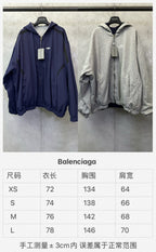 Balenciaga hooded jackets, navy and heather gray, front views with full zips