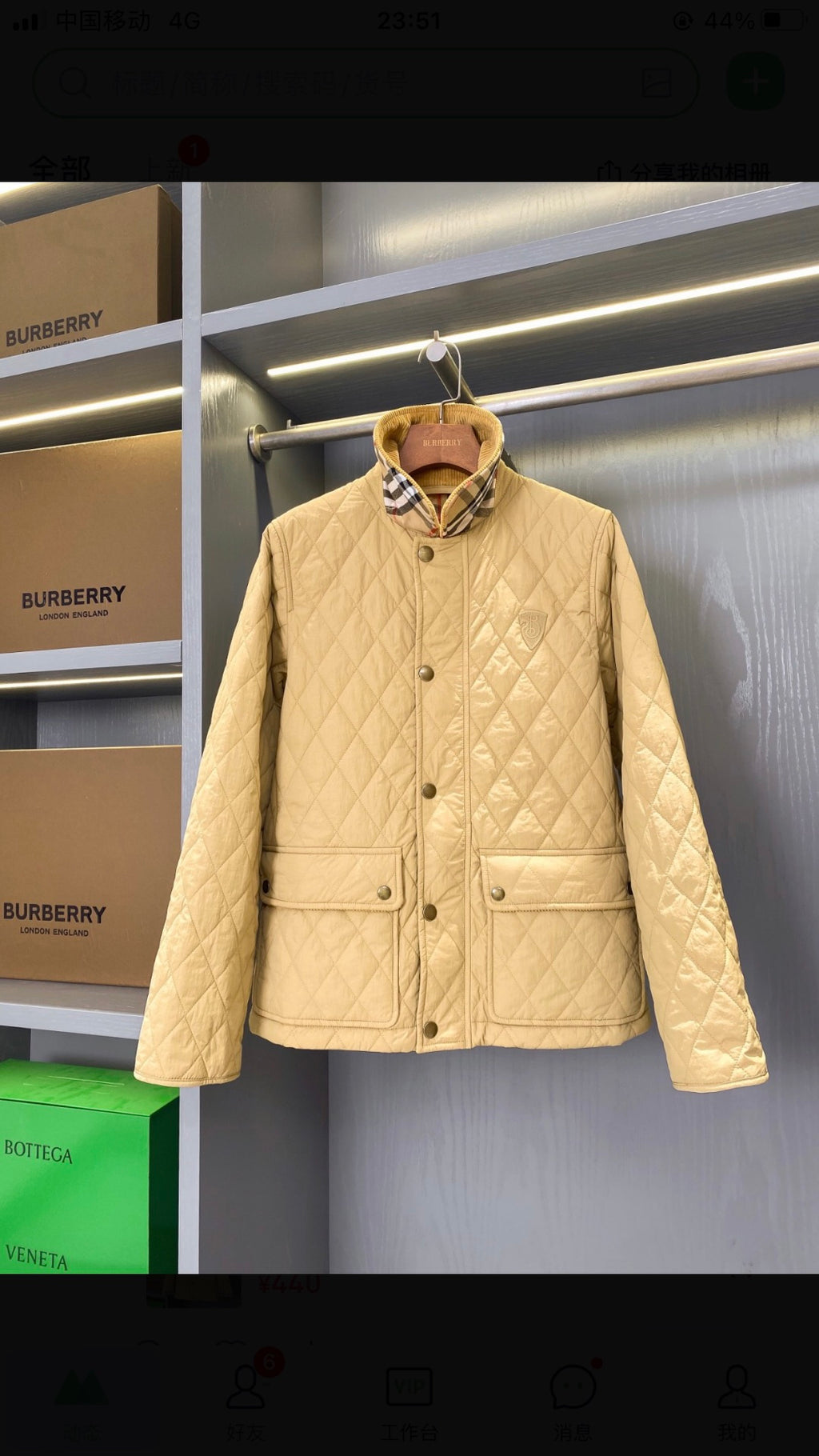 Light quilted jacket with button front, stand collar, and two chest pockets