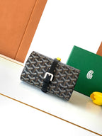 Goyard patterned belt bag with black buckle and black strap detail