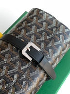 Goyard belt bag close-up with black leather strap and silver-tone buckle