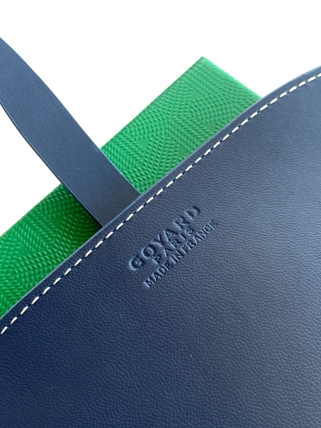 GOYARD Paris embossed on navy leather trim of patterned bag