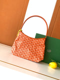 Goyard patterned mini handbag with green interior lining and orange leather trim