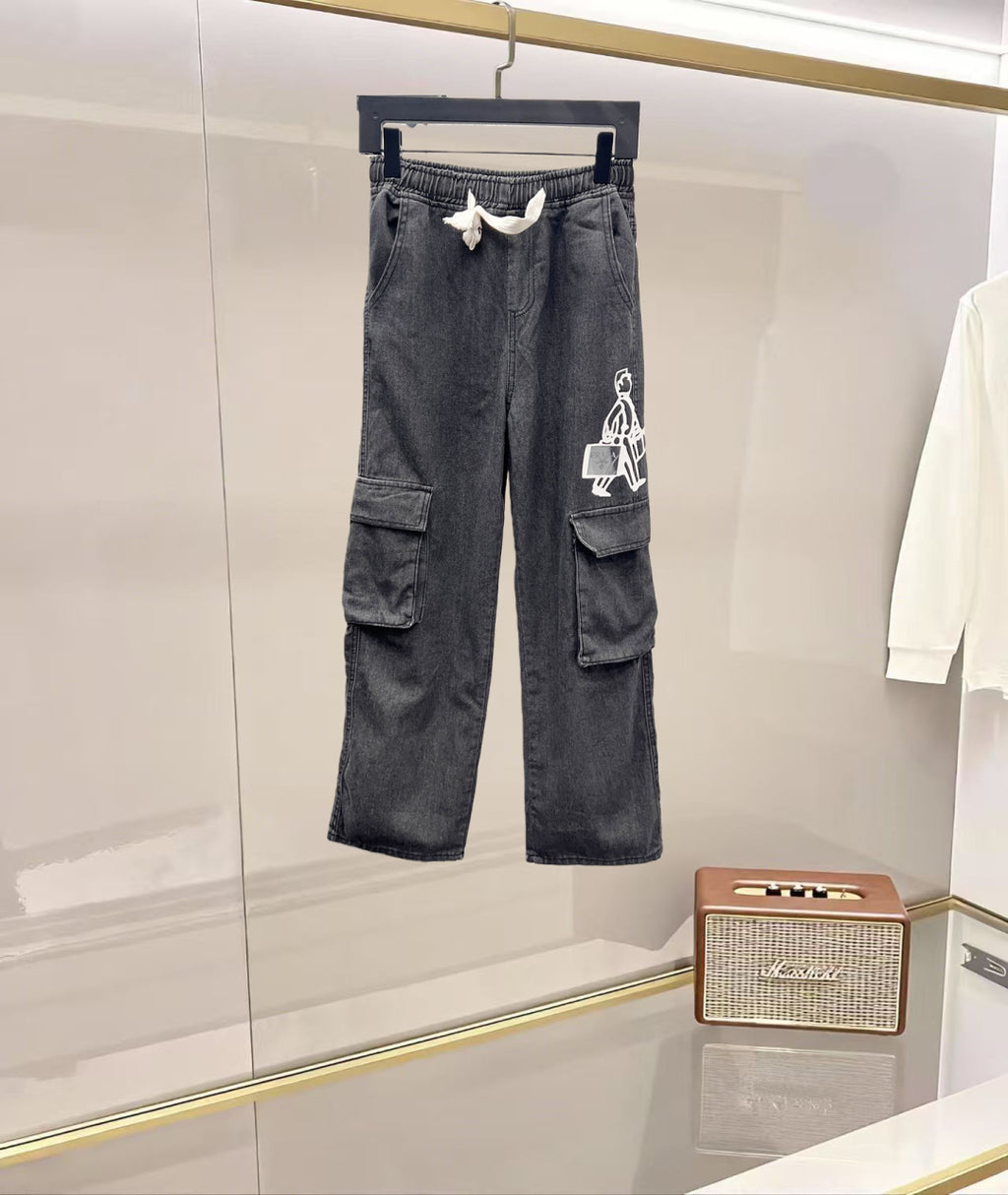 Dark gray denim cargo pants with elastic waistband and side flap pockets