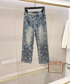 Light blue denim pants with scattered white Louis Vuitton monogram pattern