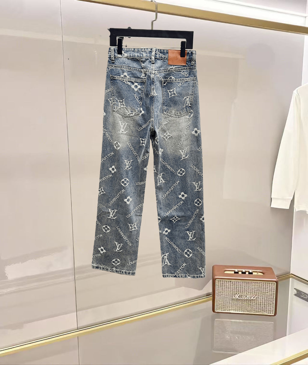Light blue denim pants featuring scattered white Louis Vuitton monogram print