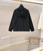 Moncler long black hooded jacket, back view with hood and front zipper