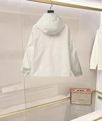 Long hooded Moncler jacket in white with back view and drawstring hood